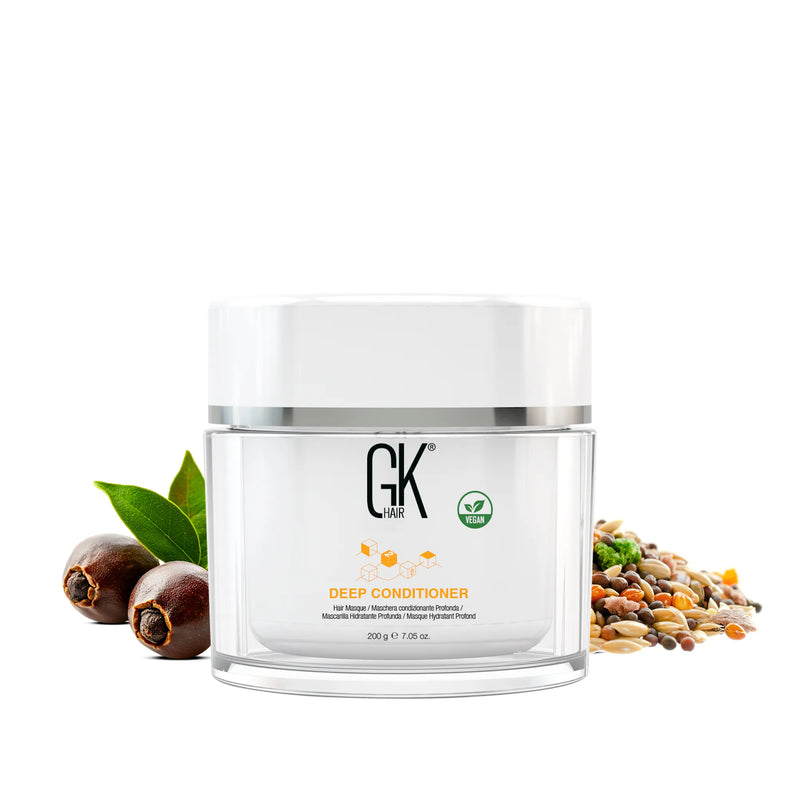 GK Hair Deep Conditioner hair masque jar, 200 g / 7.05 oz., vegan badge, framed by argan nuts, leaves and seeds