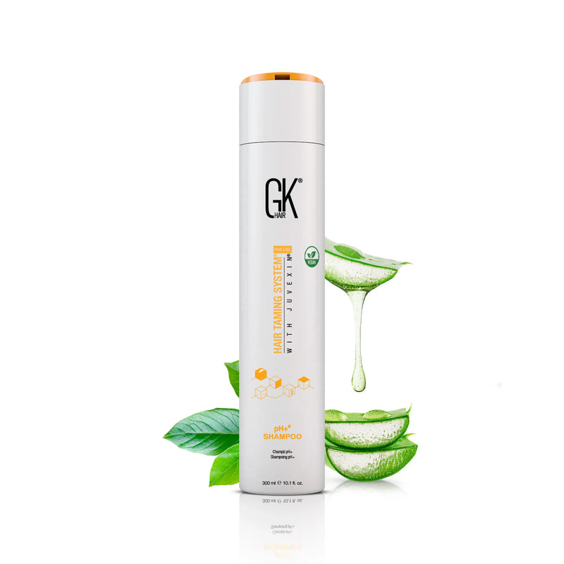 GK Hair pH+ Shampoo Pro 300 ml white bottle with an orange flip cap, beside aloe vera leaves and dripping gel